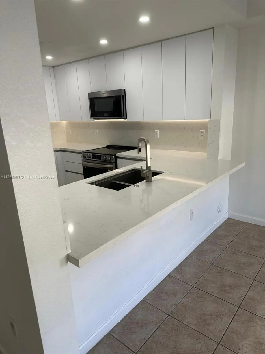 South Florida Real Estate | View 11002 NW 83rd St, 112 | 3 Beds, 2 Baths