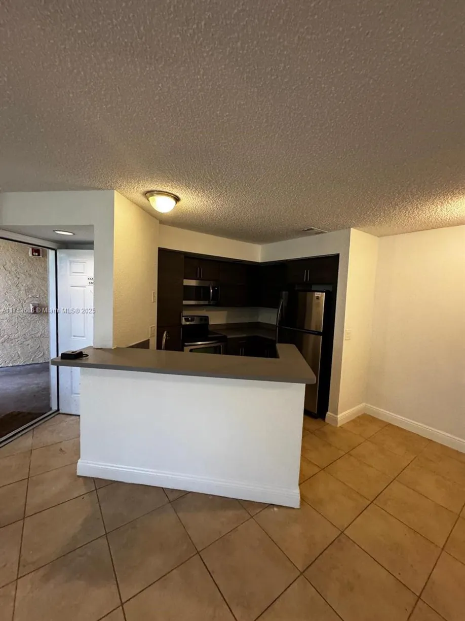 South Florida Real Estate | View 3440 N Pinewalk Dr N, 516 | 1 Bed, 1 Bath
