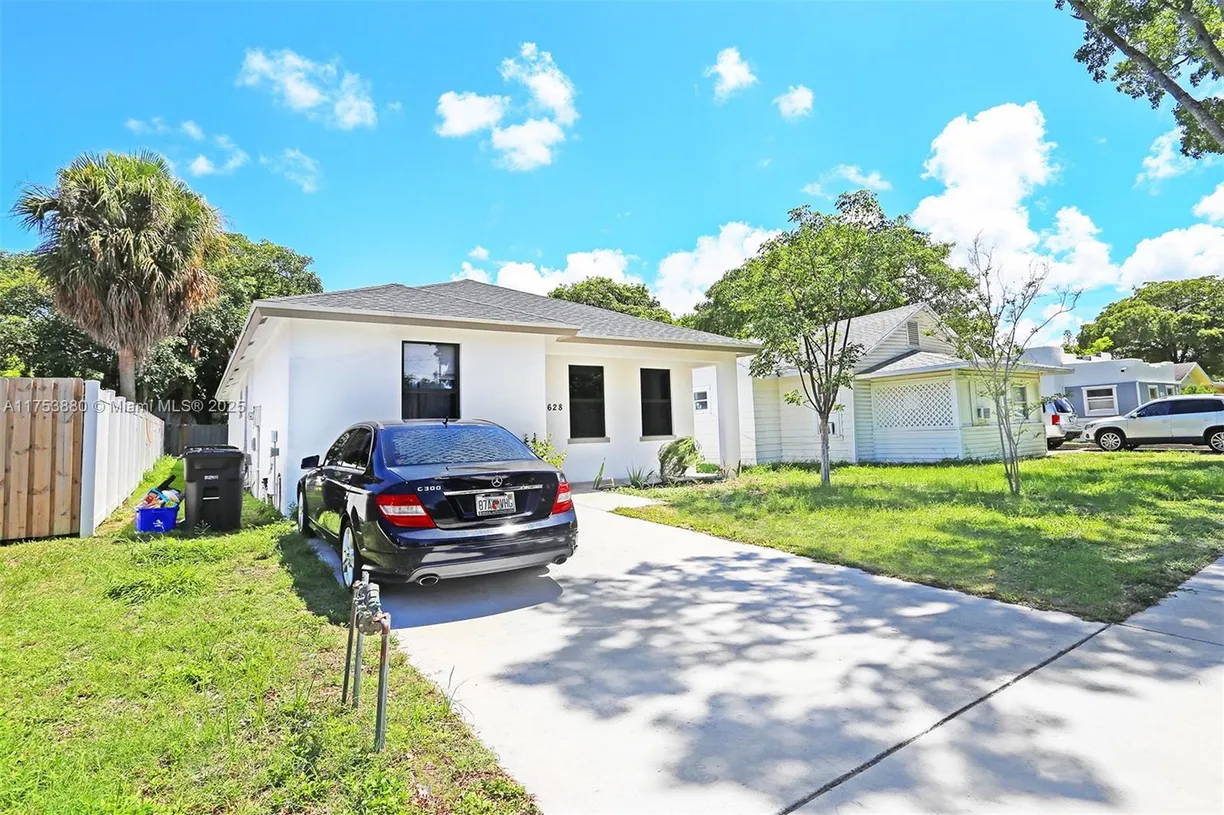 South Florida Real Estate | View 628 53rd St | 4 Beds, 2 Baths