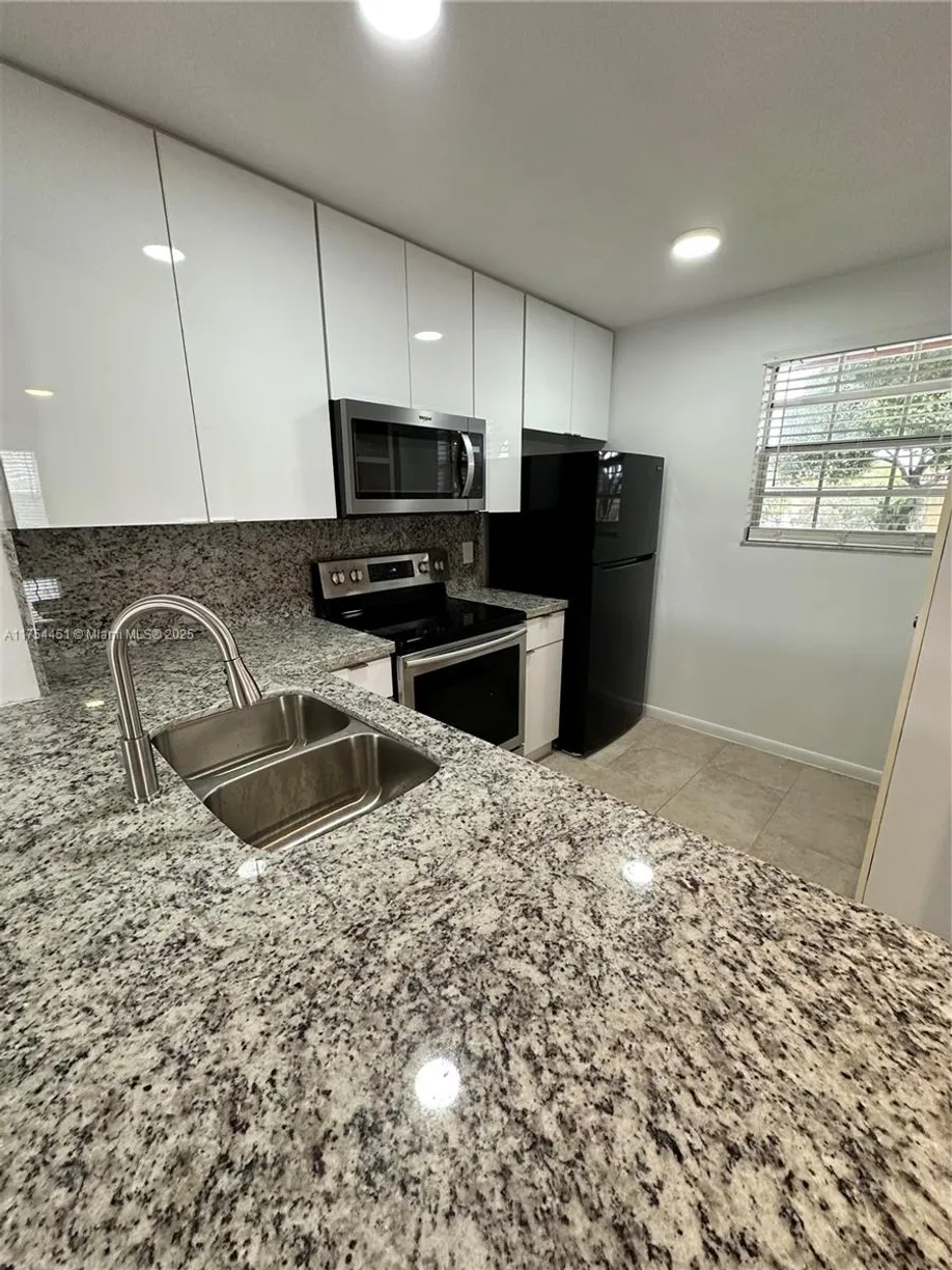 South Florida Real Estate | View 10445 NW 8th St, 201 | 2 Beds, 2 Baths