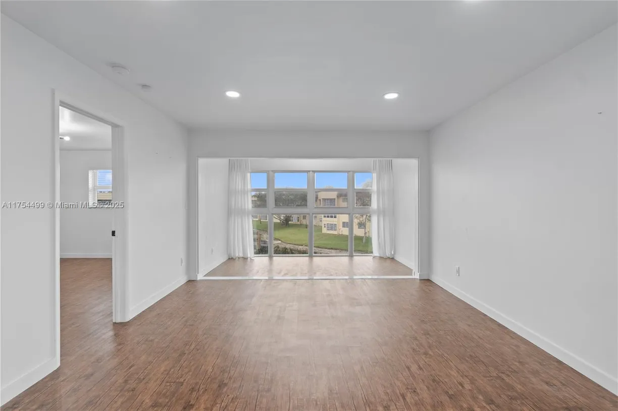 South Florida Real Estate | View 5851 NW 62nd Ave, 312 | 2 Beds, 2 Baths
