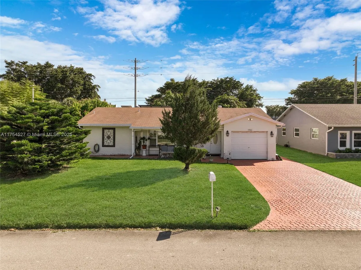 South Florida Real Estate | View 9400 NW 70th St | 2 Beds, 2 Baths