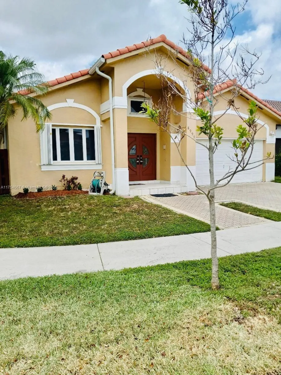 South Florida Real Estate | View 8995 NW 148th St, 8995 | 4 Beds, 2 Baths