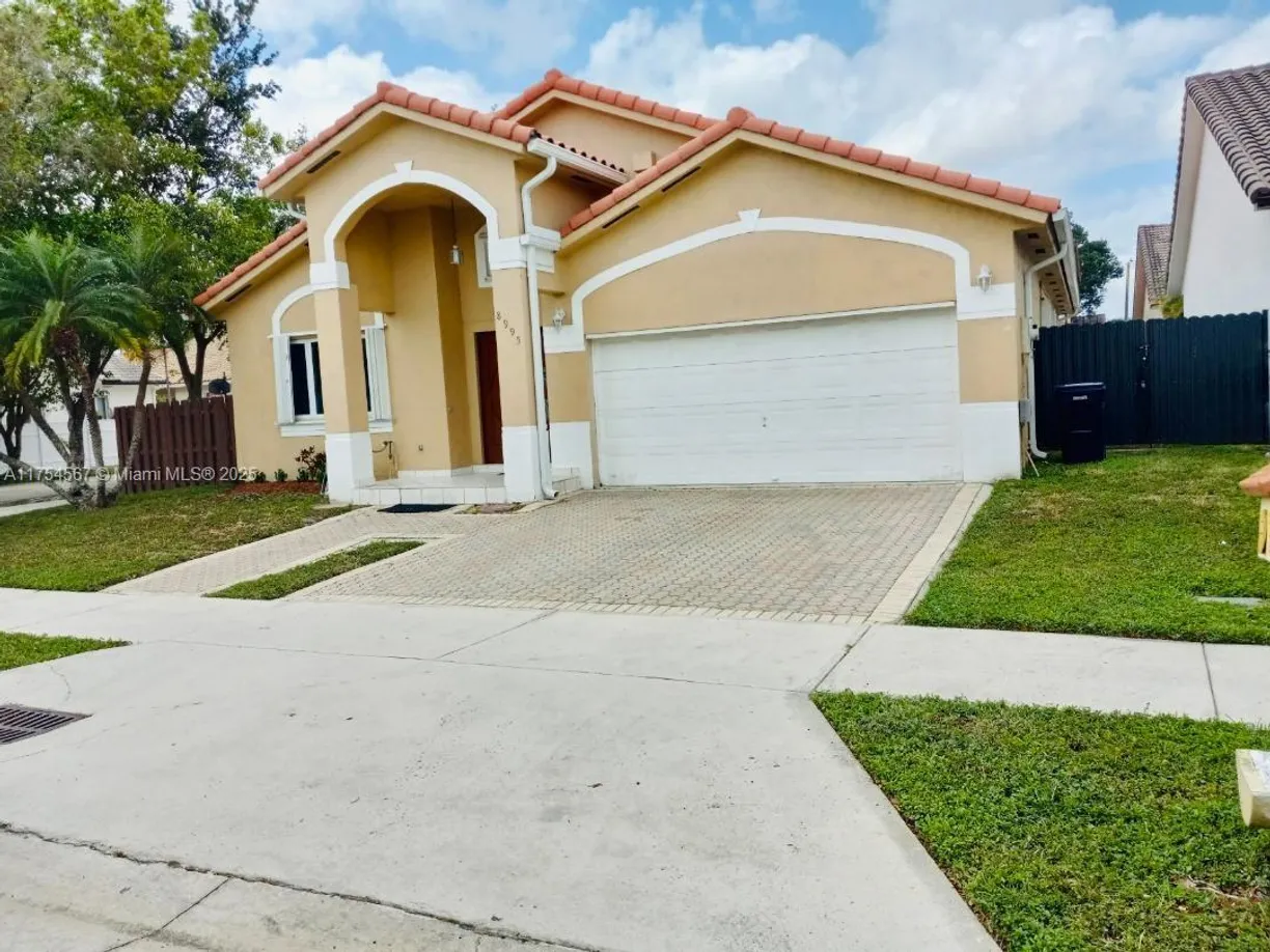 South Florida Real Estate | View 8995 NW 148th St, 8995 | Listing