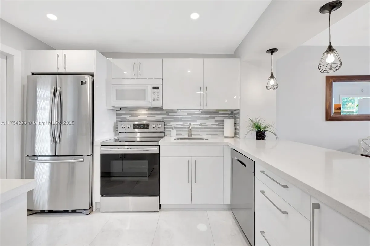 South Florida Real Estate | View 3091 N Course Dr, 305 | Listing