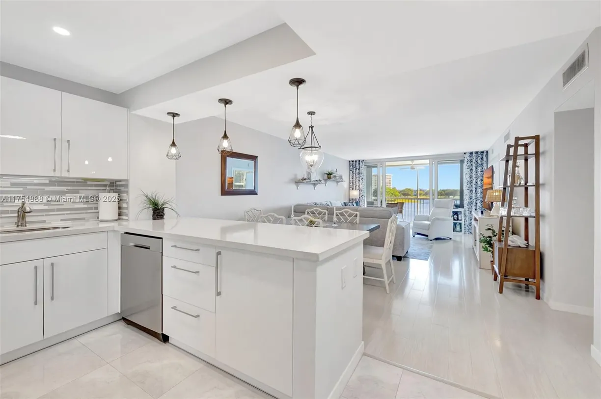 South Florida Real Estate | View 3091 N Course Dr, 305 | 2 Beds, 2 Baths