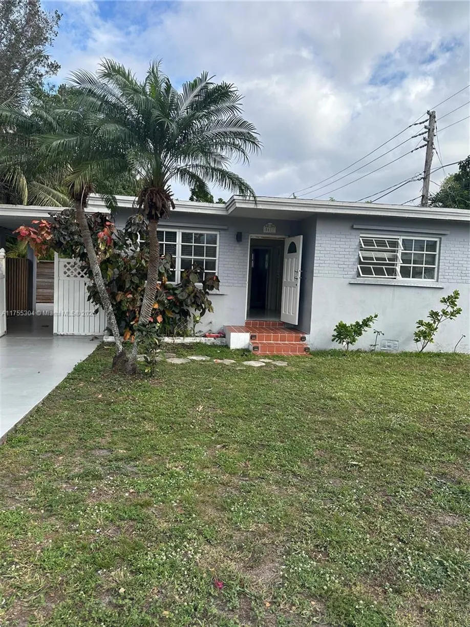 South Florida Real Estate | View 5611 Tyler St, 1 | 2 Beds, 1 Bath