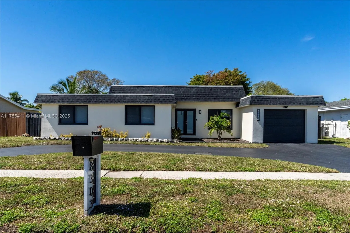 South Florida Real Estate | View 8303 NW 74th Ave | 3 Beds, 2 Baths