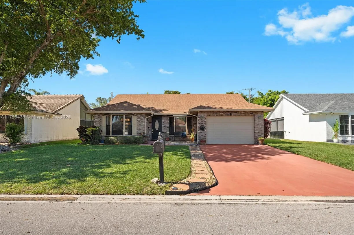 South Florida Real Estate | View 10015 NW 71st Ct | 2 Beds, 2 Baths