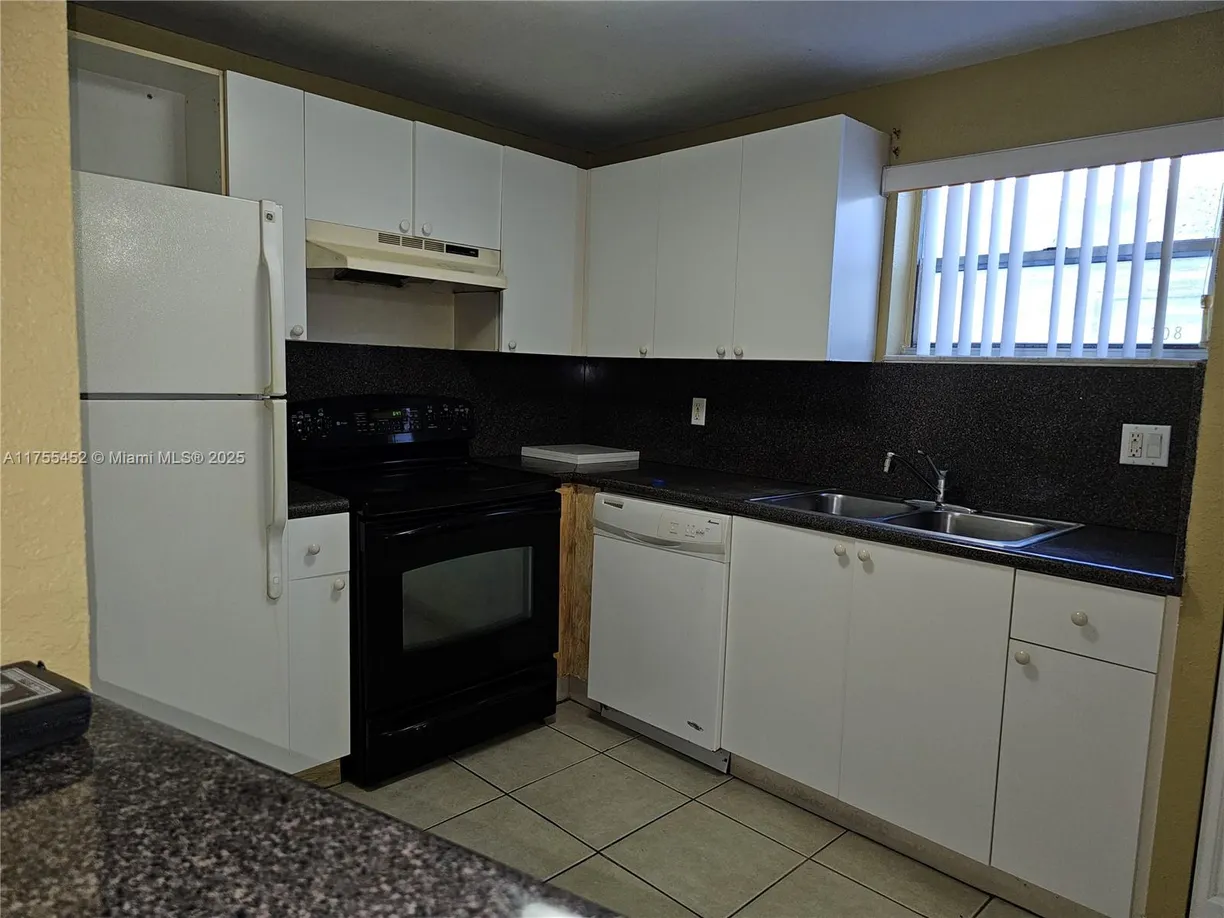 South Florida Real Estate | View 4235 N University Dr, 314 | Listing