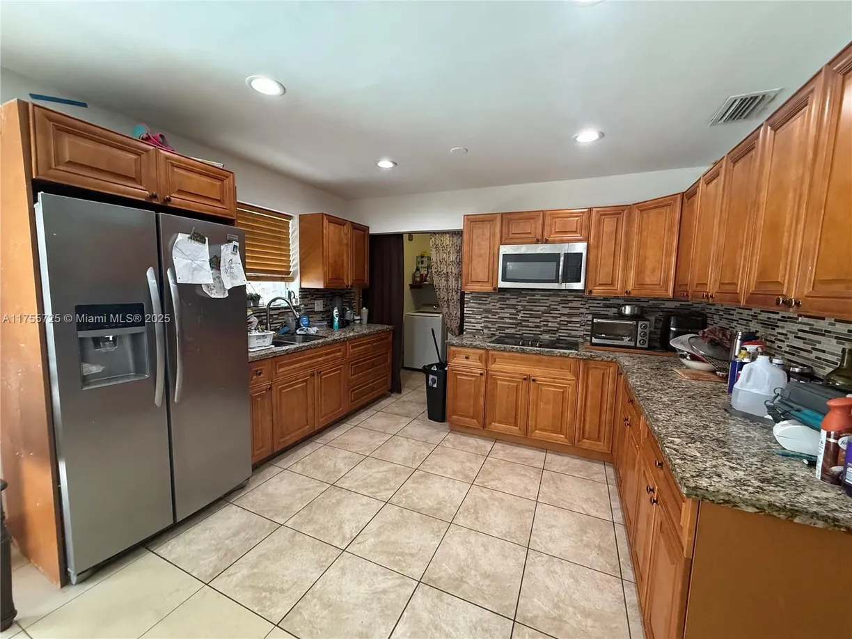 South Florida Real Estate | View 6570 Hayes St, 6570 | 3 Beds, 2 Baths
