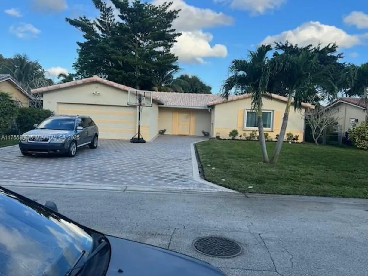 South Florida Real Estate | View 3971 NW 109th Ave | 4 Beds, 2 Baths