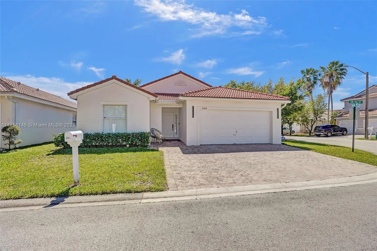 South Florida Real Estate | View 3380 SW 50th St | 3 Beds, 2 Baths