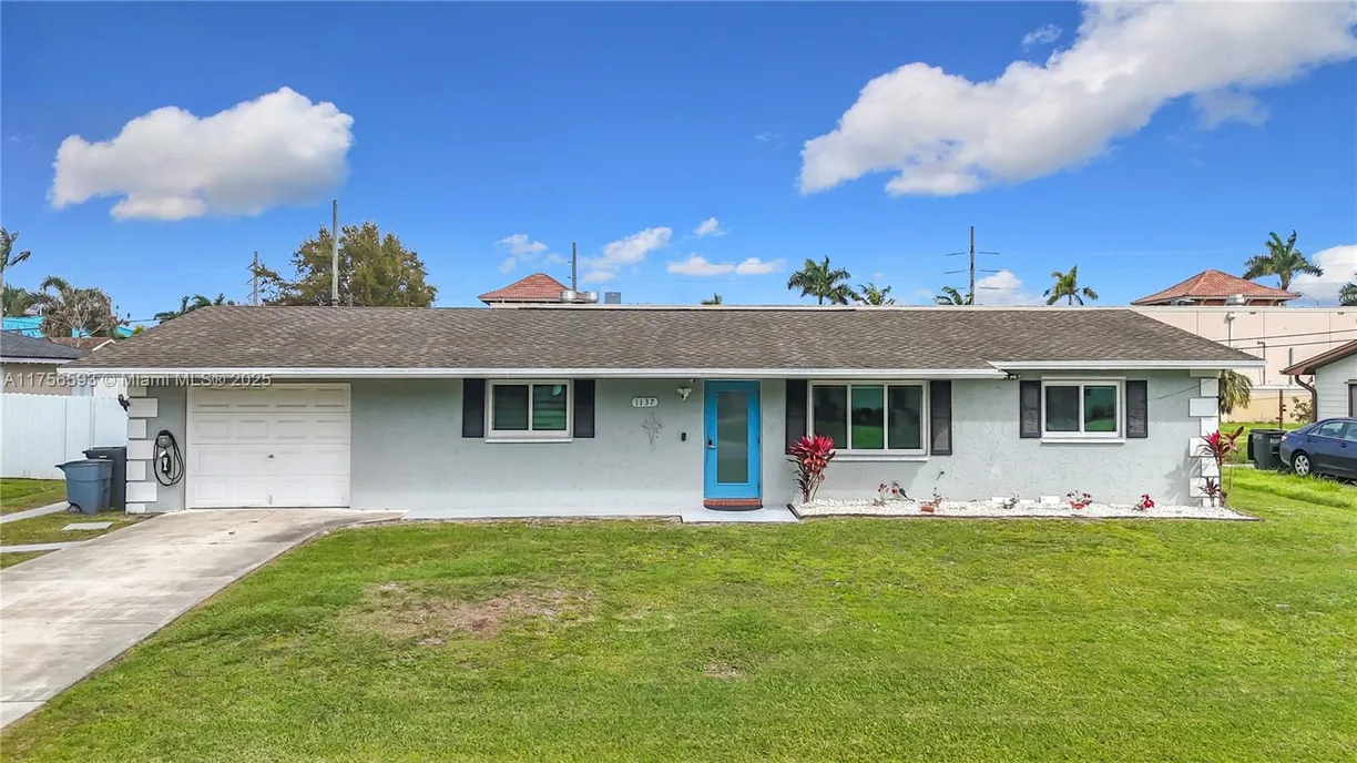 South Florida Real Estate | View 1137 SE Petunia Ave | 3 Beds, 2 Baths