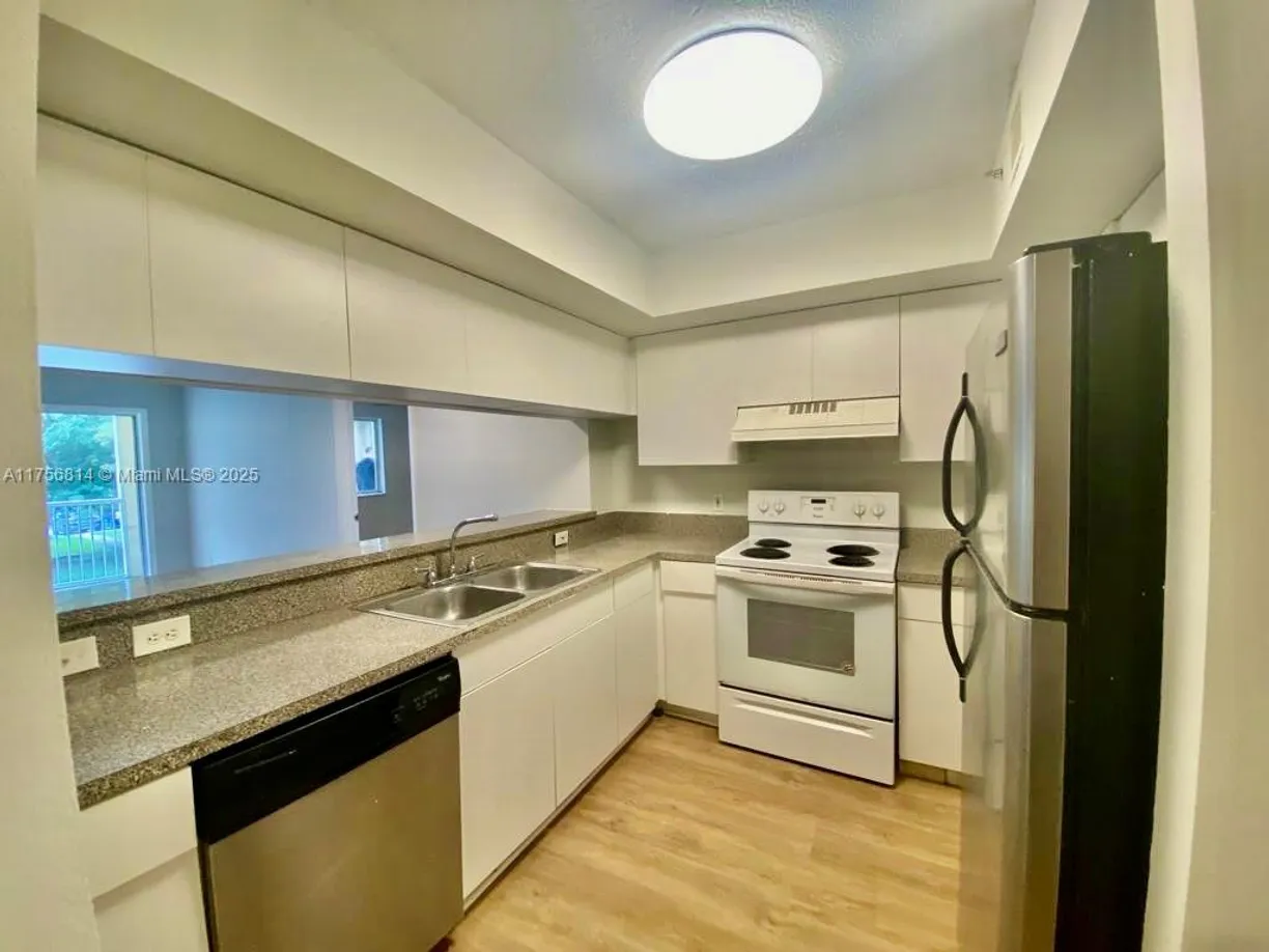 South Florida Real Estate | View 430 S Park Rd, 3-209 | 2 Beds, 2 Baths