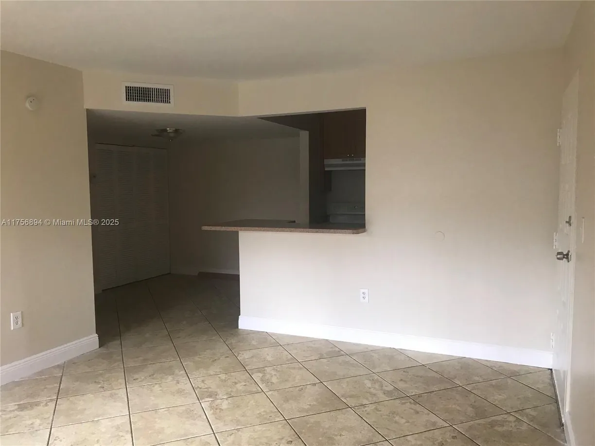 South Florida Real Estate | View 7070 NW 179th St, 107 | 1 Bed, 1 Bath