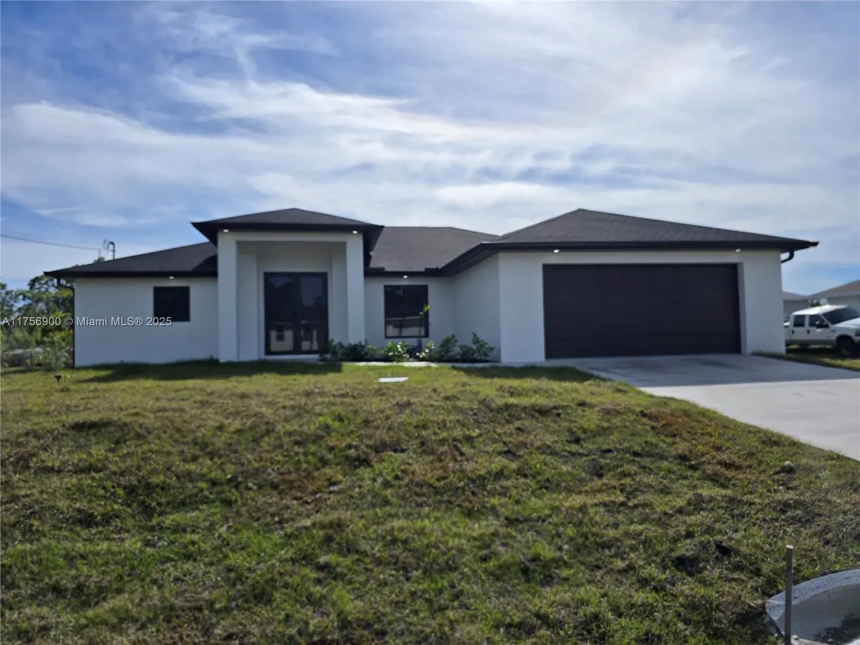 South Florida Real Estate | View 1605 W 11th Street | 4 Beds, 2 Baths