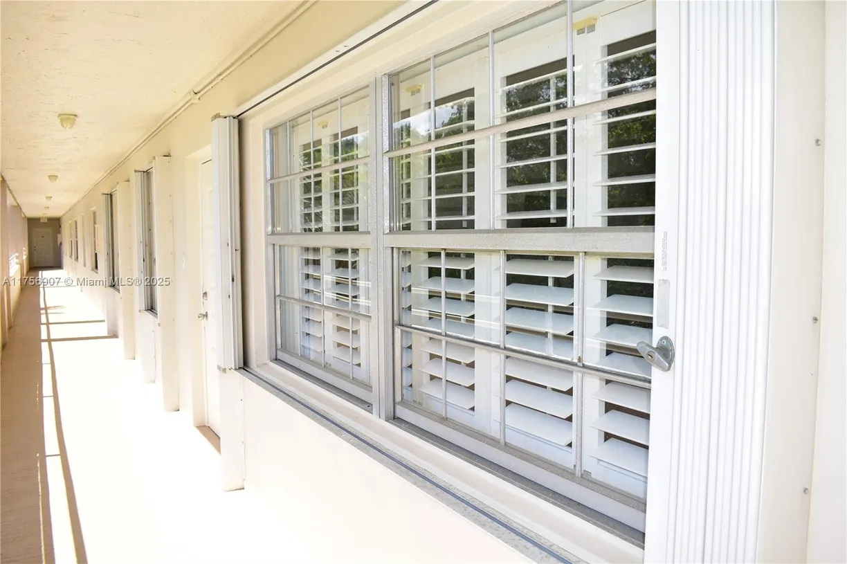 South Florida Real Estate | View 3970 Oaks Clubhouse Dr, 307 | Listing