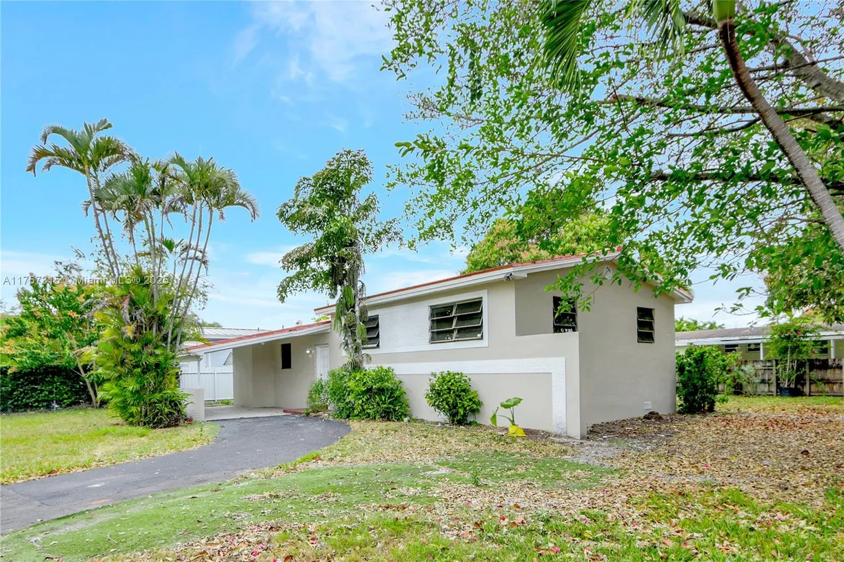 South Florida Real Estate | View 7831 SW 15th St | 3 Beds, 2 Baths