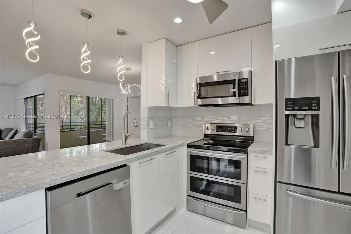 South Florida Real Estate | View 9850 NW 3rd St, 4 | Listing