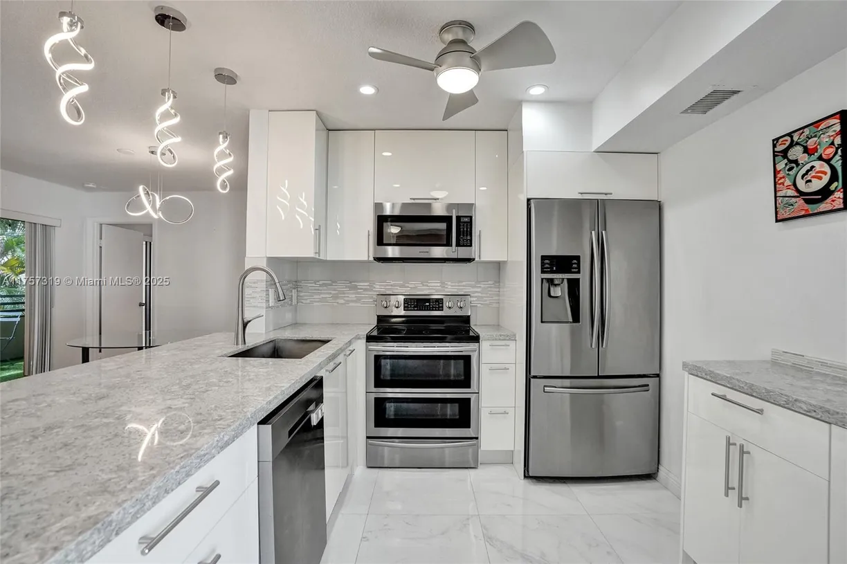 South Florida Real Estate | View 9850 NW 3rd St, 4 | 3 Beds, 2 Baths