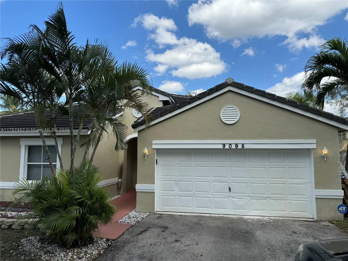 South Florida Real Estate | View 9095 SW 20th St | 4 Beds, 2 Baths