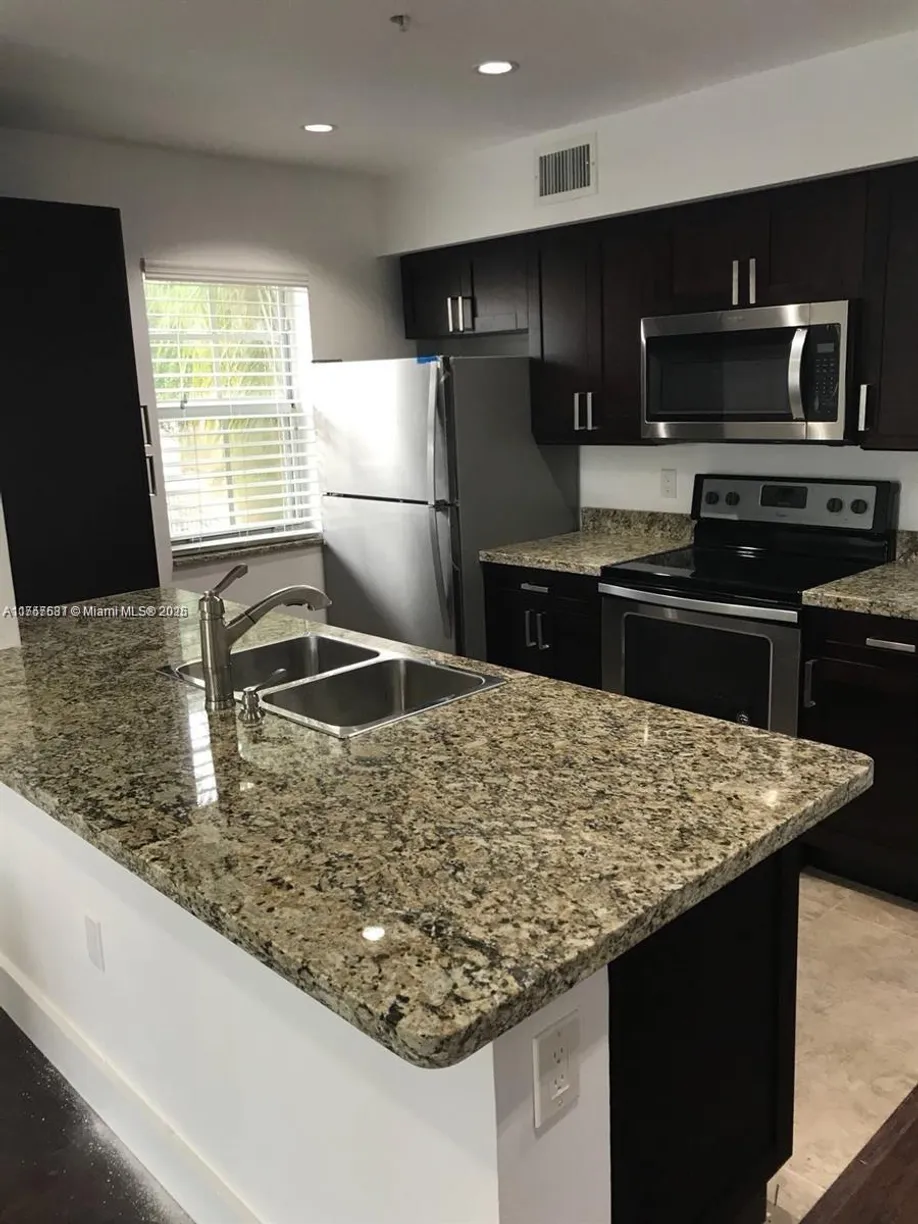 South Florida Real Estate | View 2163 Renaissance Blvd, 208 | 2 Beds, 1 Bath