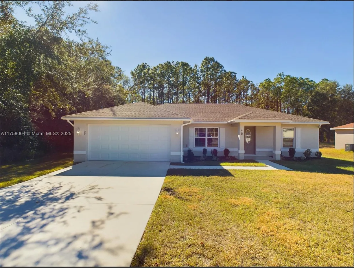 South Florida Real Estate | View 128 Cedar Road | 3 Beds, 2 Baths