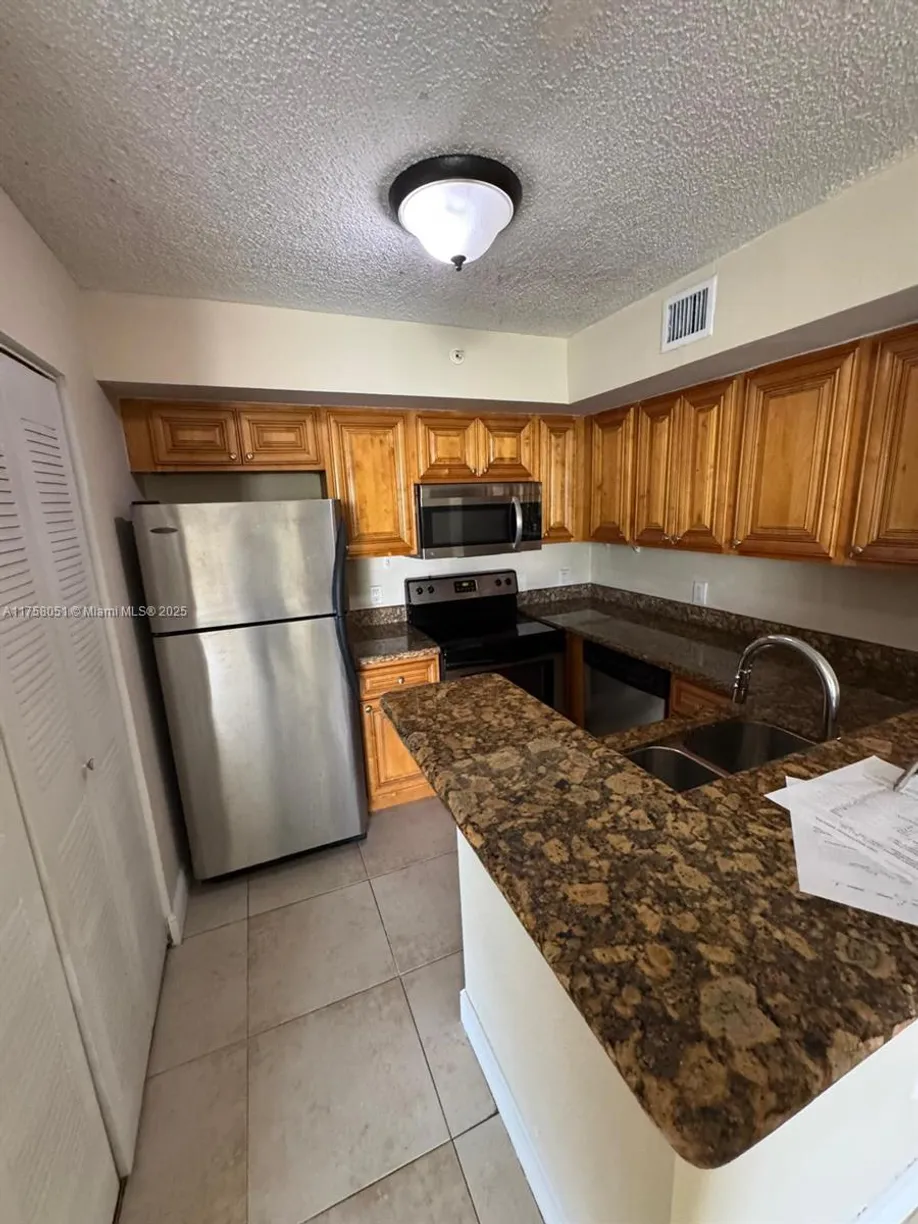 South Florida Real Estate | View 12142 ST ANDREWS PL, 110 | 2 Beds, 2 Baths