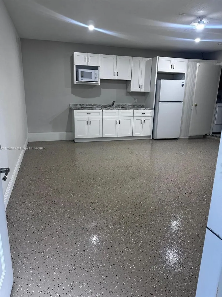 South Florida Real Estate | View 1442 SW Santiago Ave | 2 Beds, 1 Bath