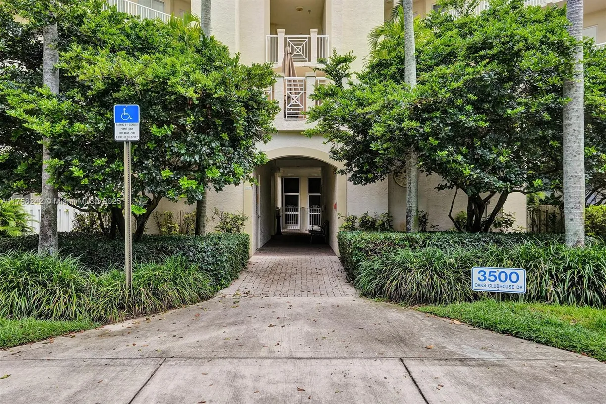 South Florida Real Estate | View 3500 Oaks Clubhouse Dr, 501 | Listing