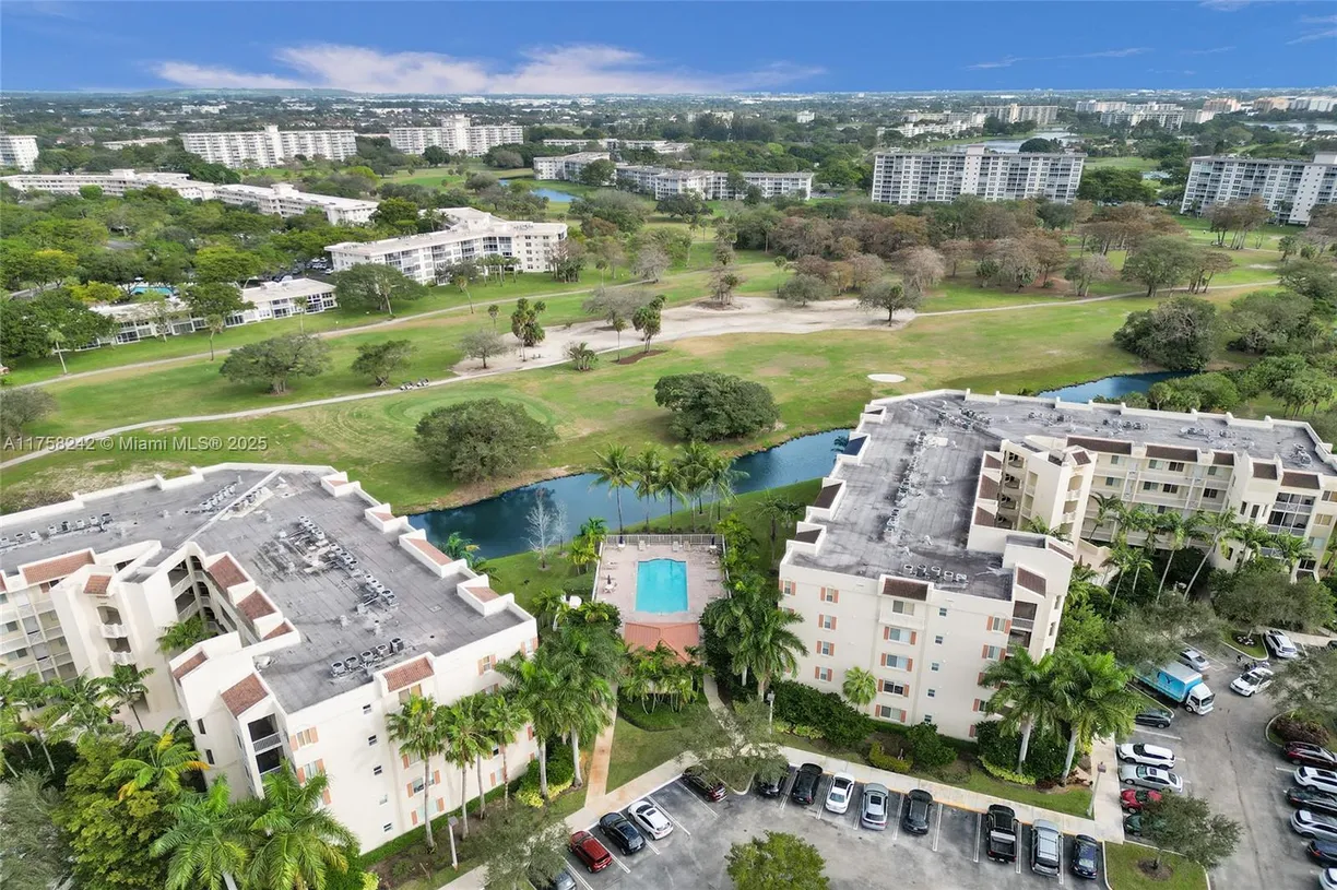 South Florida Real Estate | View 3500 Oaks Clubhouse Dr, 501 | Listing