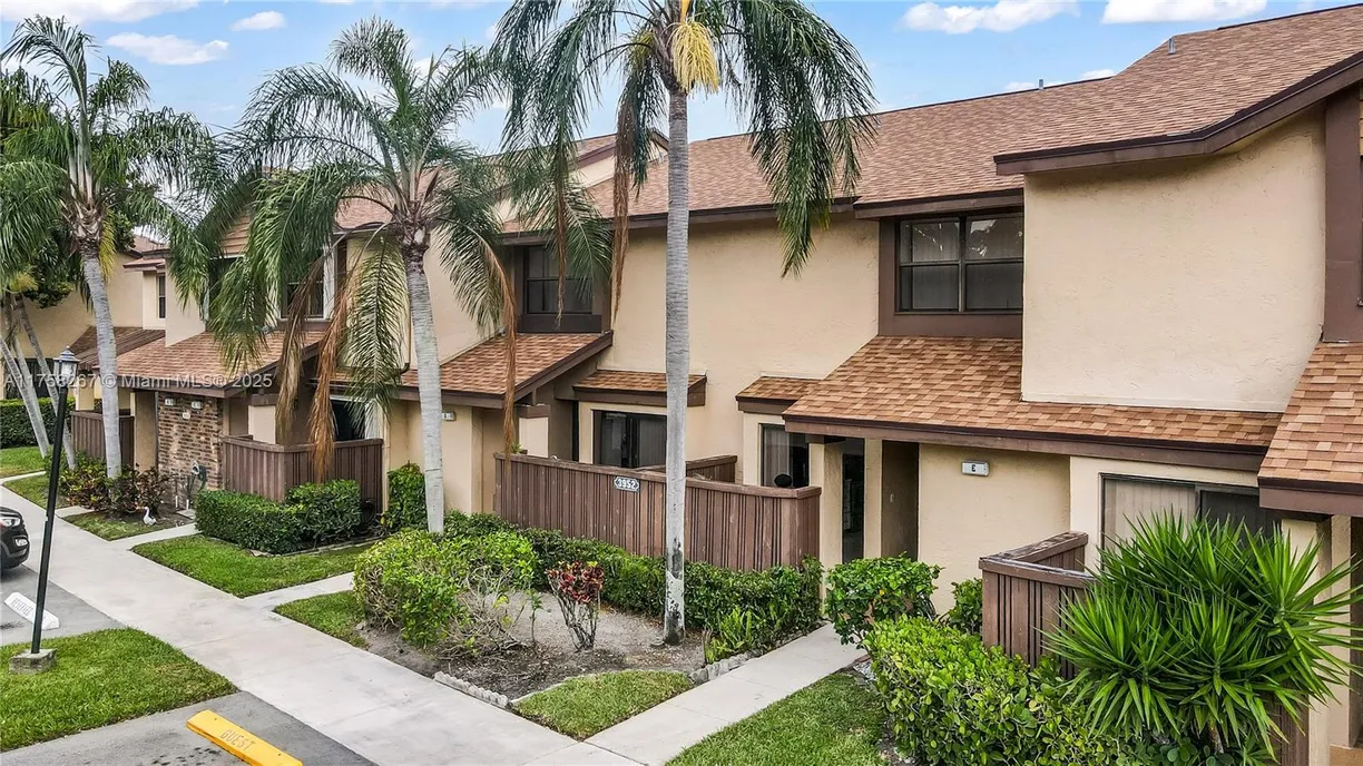 South Florida Real Estate | View 3952 Cocoplum Cir, E | 2 Beds, 2 Baths