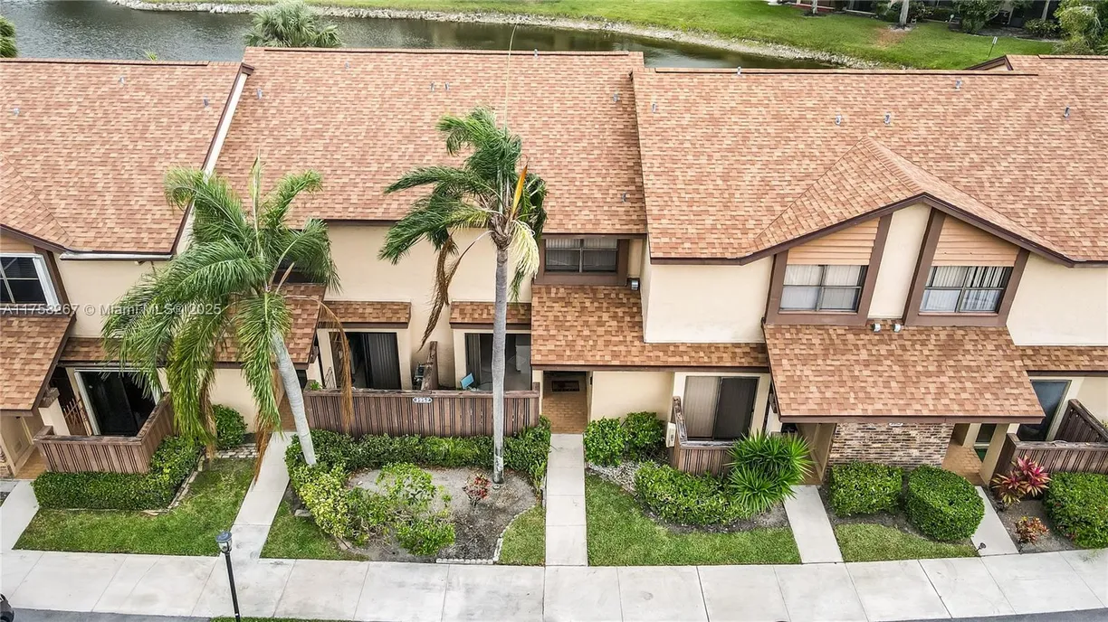 South Florida Real Estate | View 3952 Cocoplum Cir, E | Listing