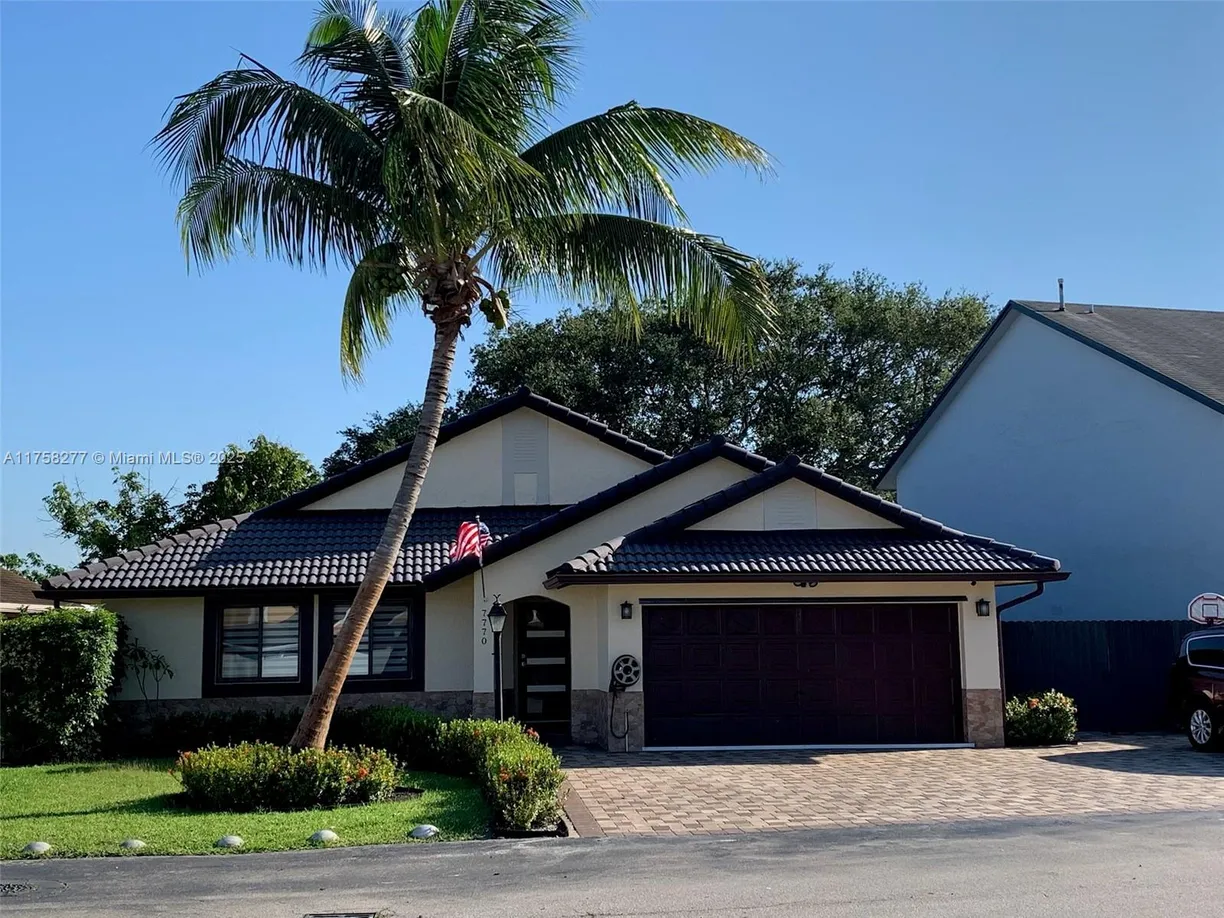 South Florida Real Estate | View 7770 NW 189th St | 3 Beds, 2 Baths