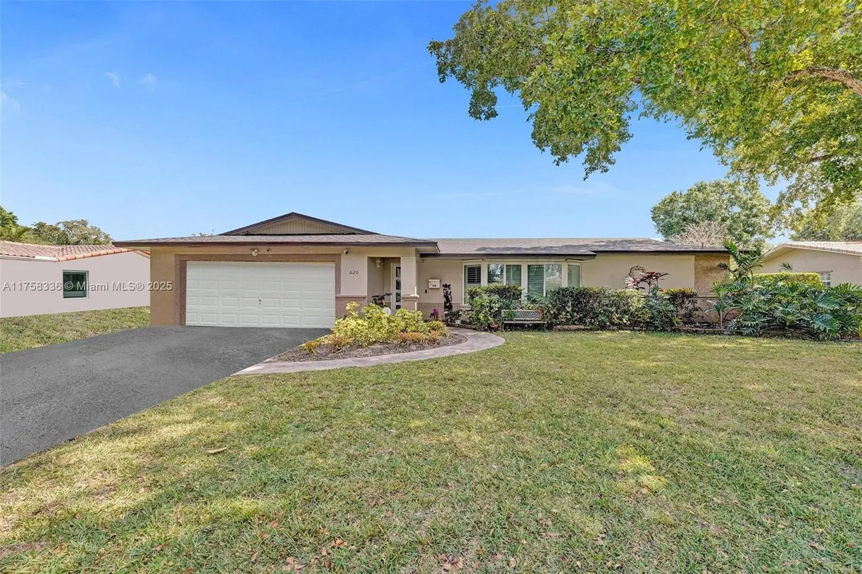 South Florida Real Estate | View 620 NW 71st Ave | 4 Beds, 2 Baths