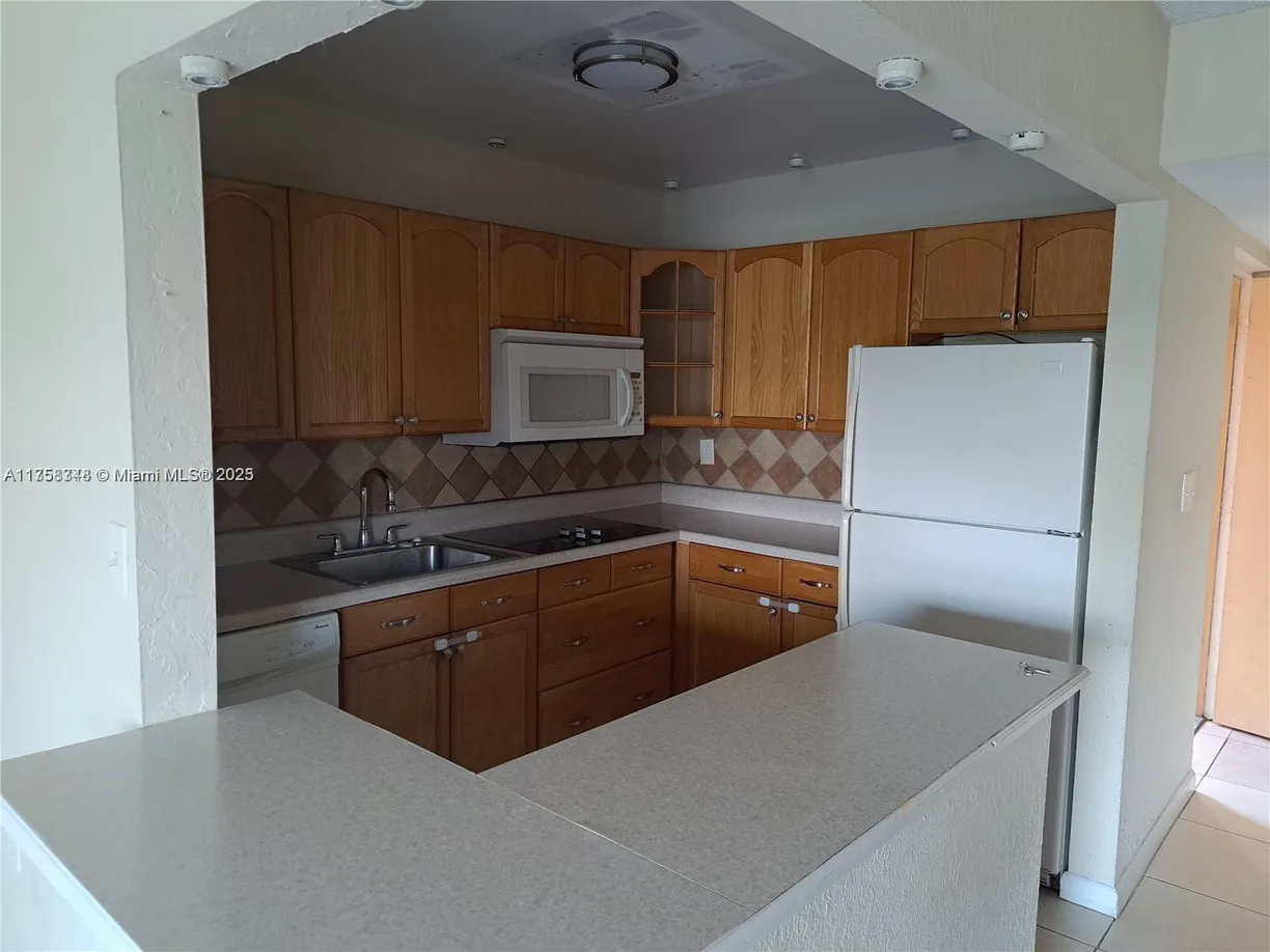 South Florida Real Estate | View 17600 NW 68th Ave, B3009 | Listing