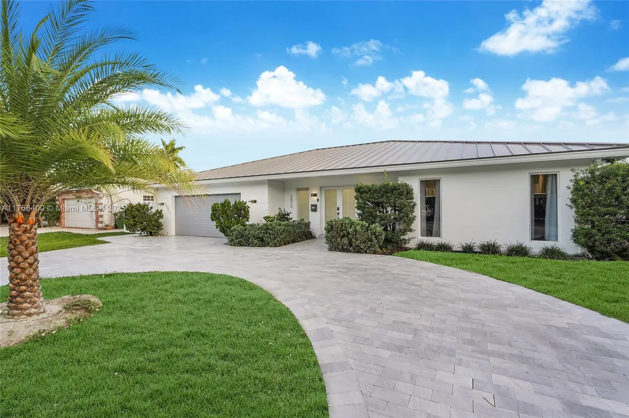 South Florida Real Estate | View 2820 NE 60th St | 3 Beds, 3 Baths