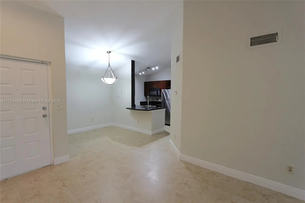 South Florida Real Estate | View 2890 N Oakland Forest Dr, 307 | Listing