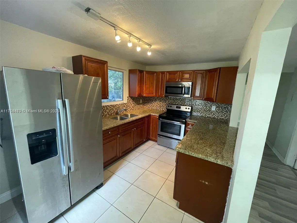 South Florida Real Estate | View 4896 SW 28th Ter | Listing