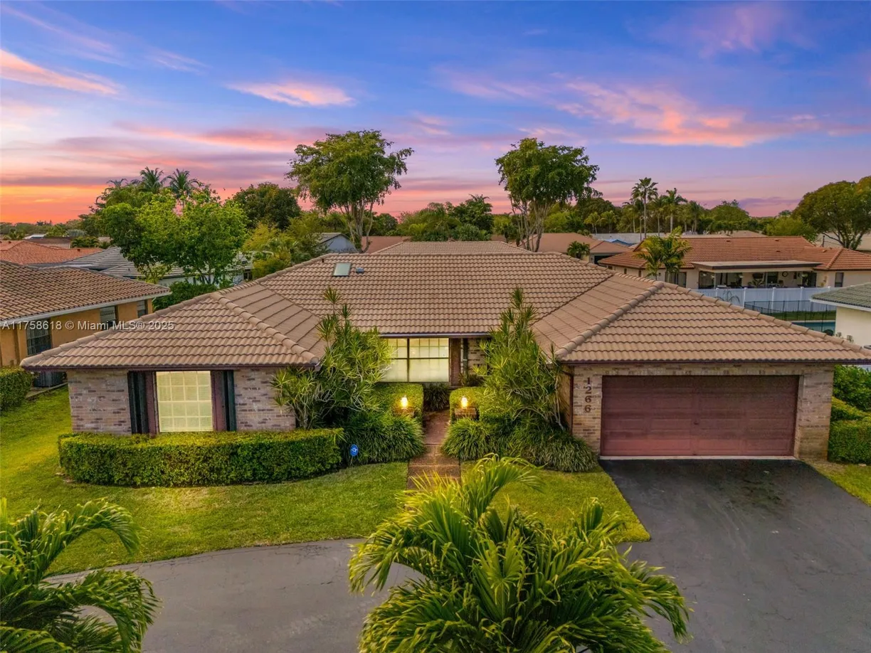 South Florida Real Estate | View 1266 NW 111th Way | 4 Beds, 3 Baths