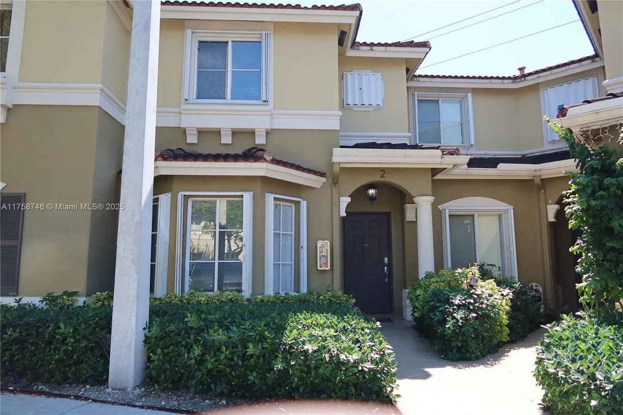South Florida Real Estate | View 8918 W Flagler St, 2 | 2 Beds, 2 Baths