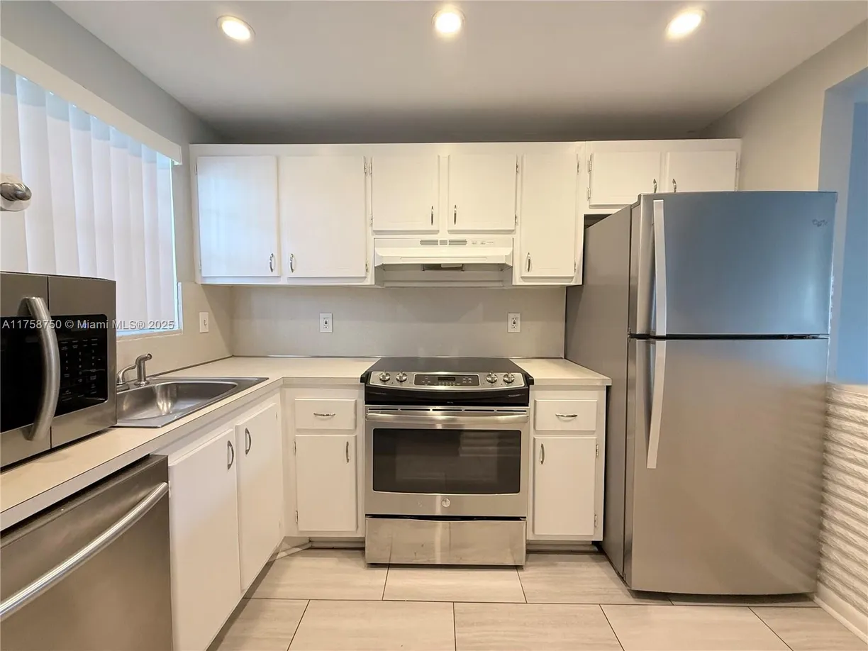 South Florida Real Estate | View 1638 Embassy Dr, 212 | 2 Beds, 2 Baths