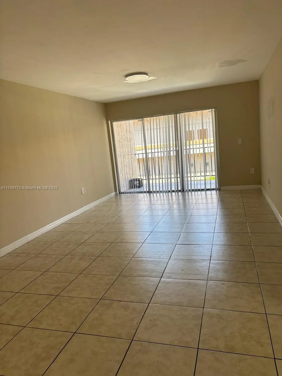 South Florida Real Estate | View 1900 W 68th St, A301 | 2 Beds, 2 Baths