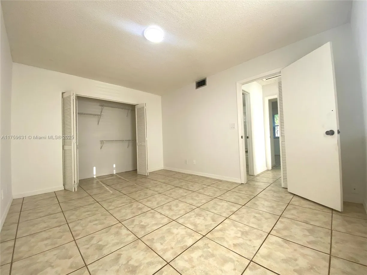 South Florida Real Estate | View 11232 SW 12th St, 202 | Listing