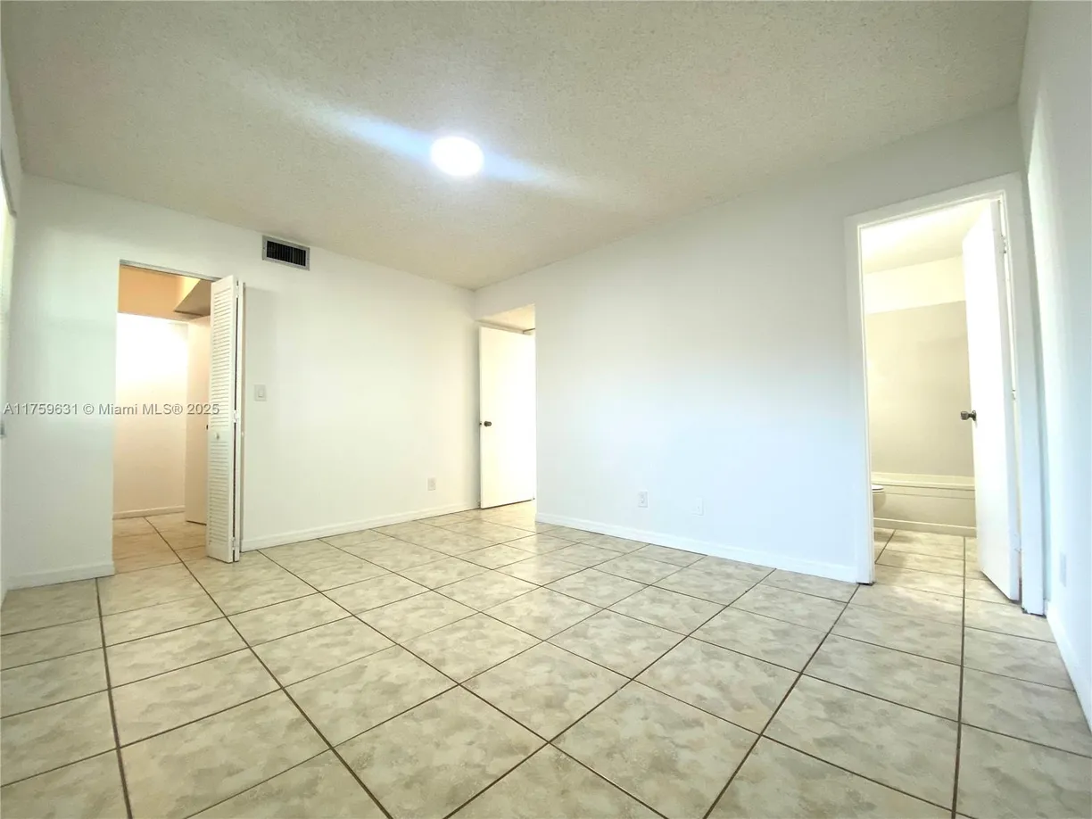 South Florida Real Estate | View 11232 SW 12th St, 202 | Listing