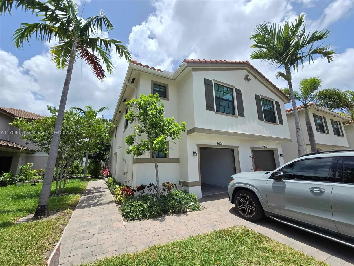 South Florida Real Estate | View 6001 Woods Edge Cir | 3 Beds, 2 Baths