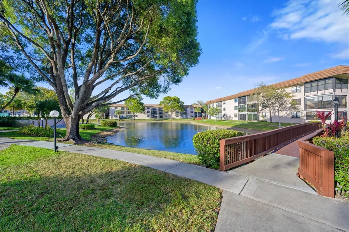 South Florida Real Estate | View 4965 E Sabal Palm Blvd, 212 | 2 Beds, 2 Baths