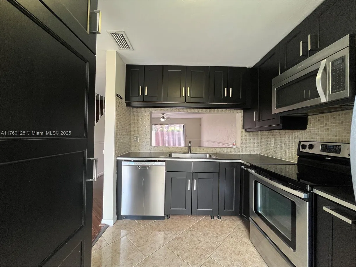 South Florida Real Estate | View 2700 S Oakland Forest Dr, 304 | Listing