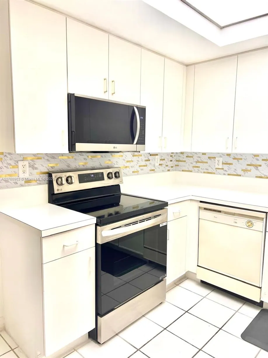 South Florida Real Estate | View 9805 NW 52nd St, 402 | 3 Beds, 2 Baths